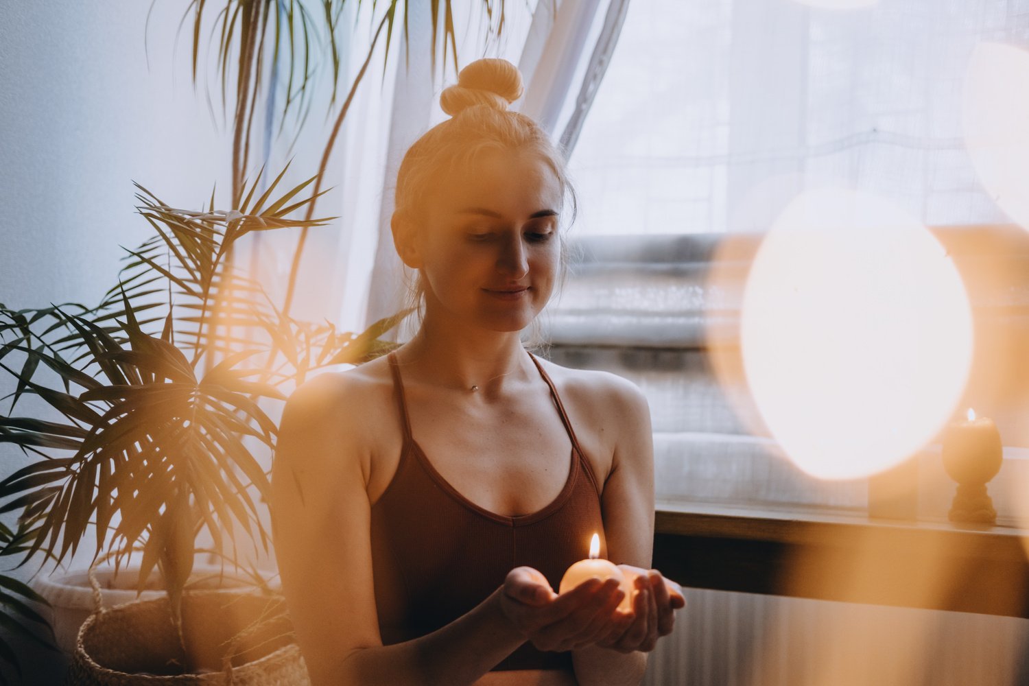 Woman Holding a Candle